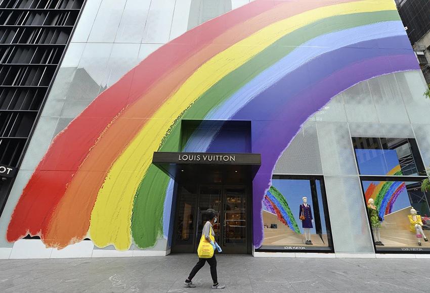 The Louis Vuitton flagship store, decorated for Pride in 2020 — Photo by Anthony Behar / Sipa USA via AP