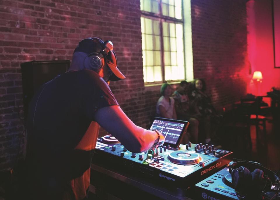 DJ Almond Brown spinning with Board of Deacons at Vermillion, 2024 - Photo by Alan Motley<br>