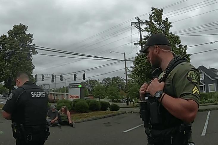 Deputies (front) Helbert and girlfriend sitting. / Dep. James Body Cam Footage