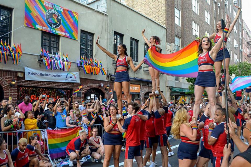 NYC Pride participants in front of the Stonewall Inn in 2019. (File photo by Andrew Nasonov)